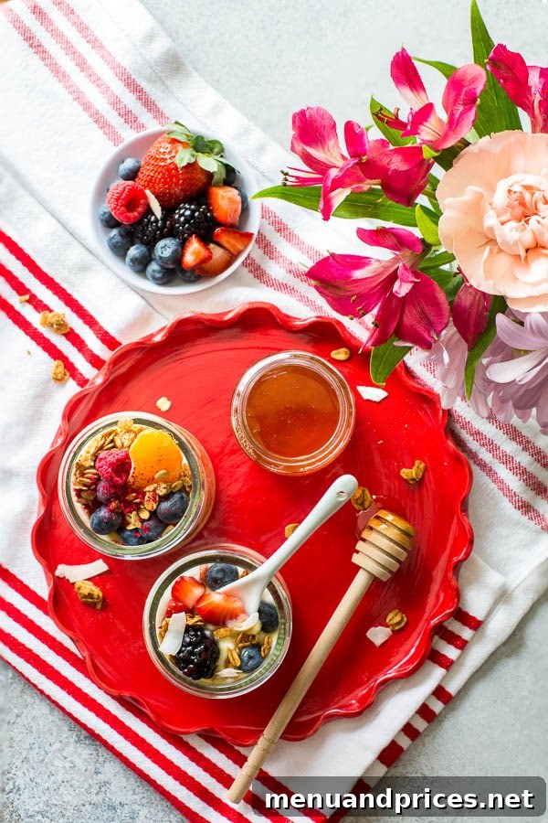 Craft Your Own Brunch Parfait Bar 6 A vibrant and customizable DIY yogurt parfait bar, perfect for a bridal shower or spring baby shower brunch, showcasing a variety of fresh ingredients.