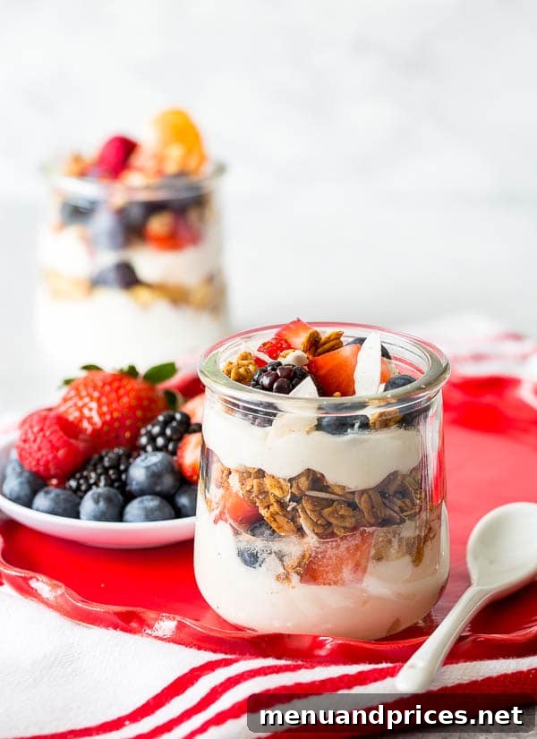 Craft Your Own Brunch Parfait Bar 7 Guests custom-building their delicious and healthy yogurt parfaits at a well-stocked bar with various fresh fruits and toppings.