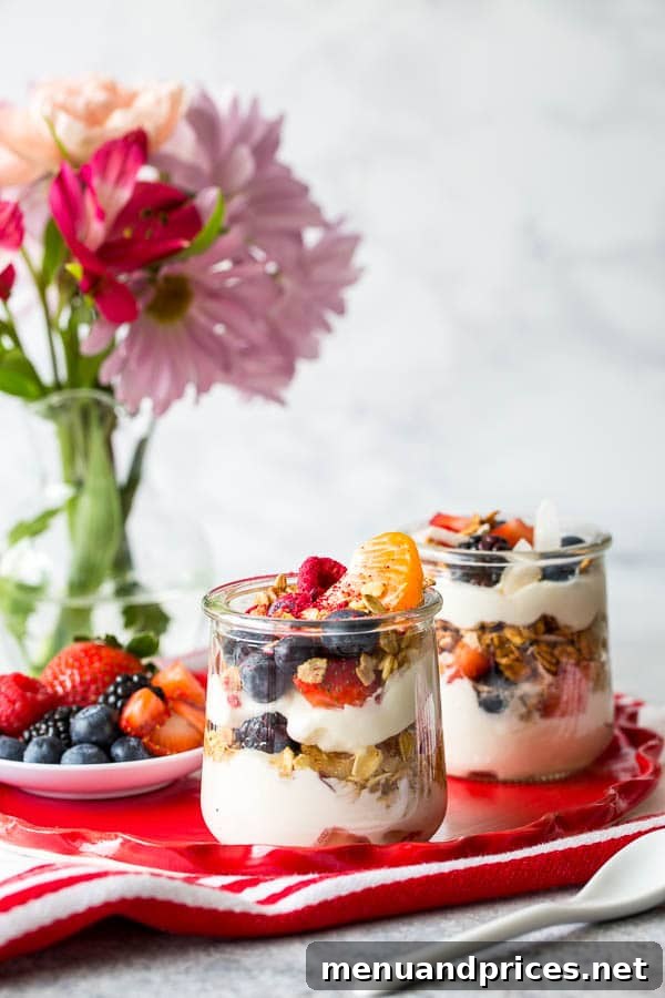 Craft Your Own Brunch Parfait Bar 9 Assorted granola and crunchy toppings displayed in clear glass jars, ready for custom yogurt parfait creations at a brunch event.