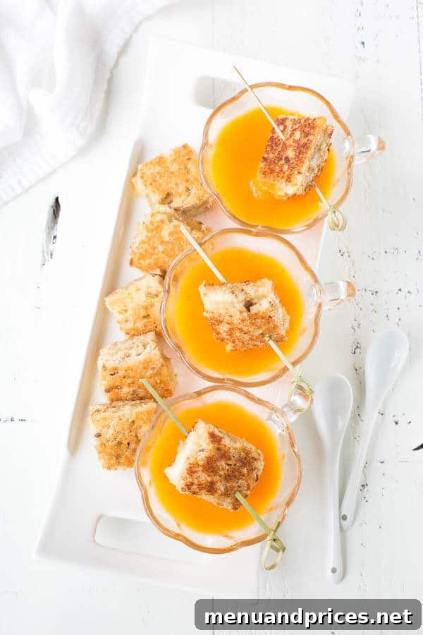 Velvety 5-Ingredient Butternut Squash Soup 3 Overhead view of a bowl of rich, orange butternut squash soup, hinting at its creamy texture and delicious fall flavors, prepared with just 5 ingredients.