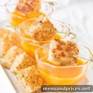 Circular image of a bowl of creamy butternut squash soup garnished with fresh herbs, ready to be served.