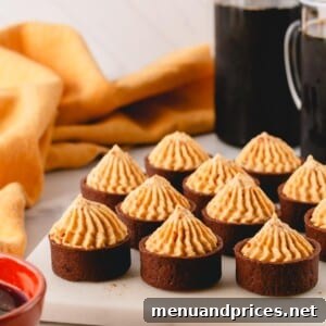 Pumpkin mousse in chocolate cups.