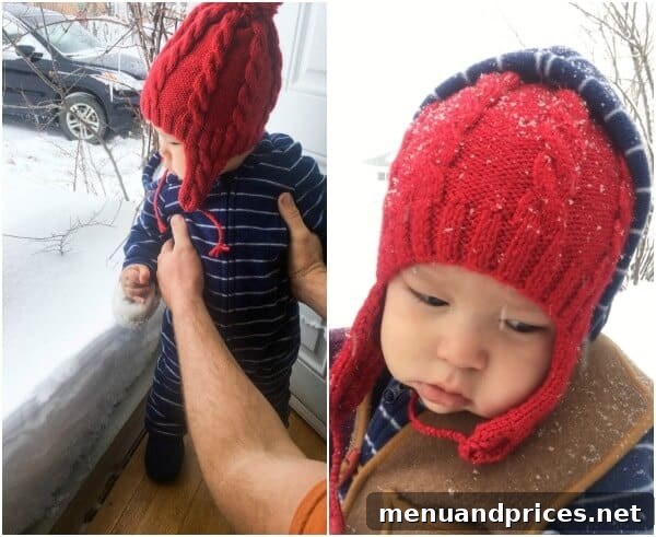 Baby Grant: 10 and 11 Month Milestones 4 Grant bundled up in a winter coat, looking indifferently at the snow.