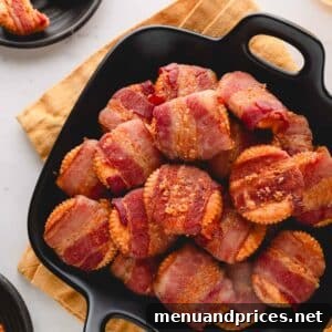 Bacon Cheddar Crisps 11 A beautiful bowl of freshly baked cheesy bacon crackers, ready to be served and enjoyed.