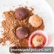 Final plated red wine truffles, elegantly presented and ready to be enjoyed