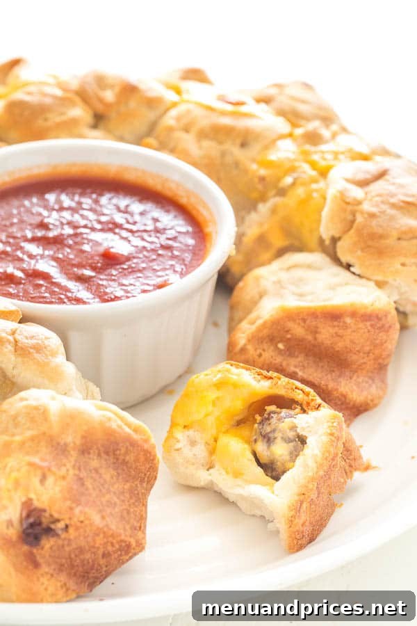 Seriously addicting meatball stuffed monkey bread - super easy finger food for a crowd.