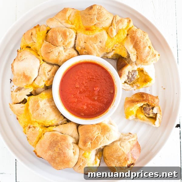 Seriously addicting meatball stuffed monkey bread - super easy finger food for a crowd.