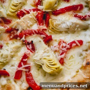 A whole grilled artichoke pizza.