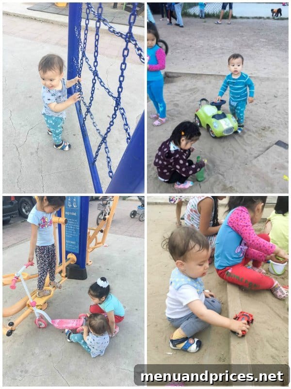 Grant's Inaugural Mongolian Expedition Part One 7 Baby Grant happily playing with tires and cars at a playground in Mongolia, surrounded by other children