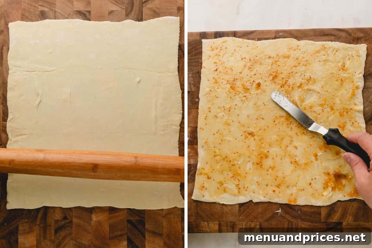 Golden Savory Spirals 5 Puff pastry dough being rolled out and topped with apricot jam.