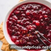 A smaller image of cranberry sauce in a white bowl, for aesthetic appeal.