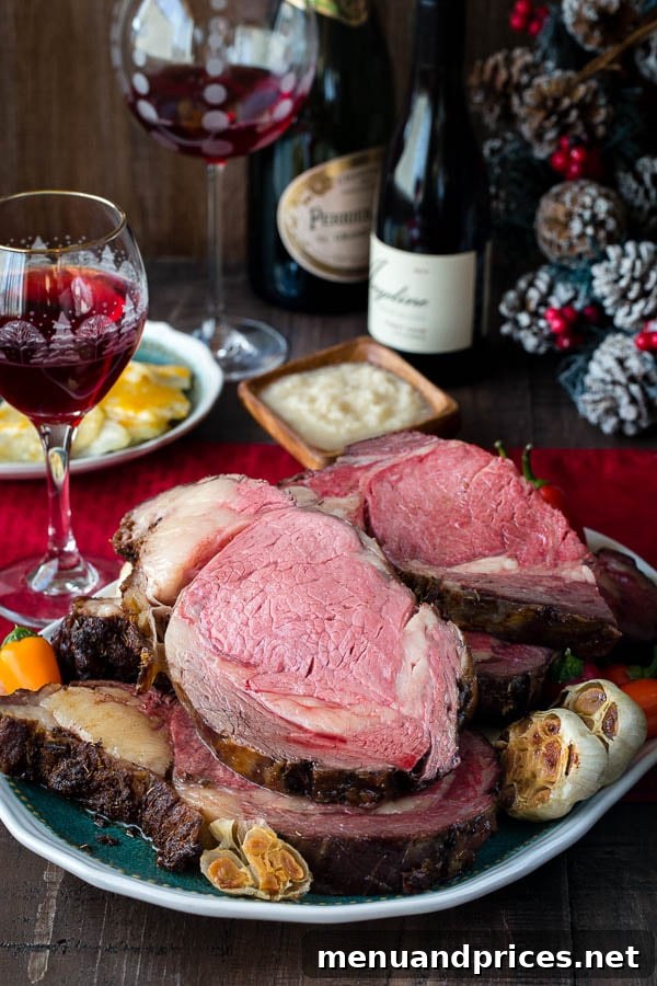 Signature Garlic Herb Crusted Boneless Prime Rib 3 A grand platter of garlic herb crusted prime rib, sliced and ready to serve, set on a beautifully decorated table with wine and complementary side dishes.