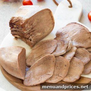 Cooked beef tongue sliced for serving.