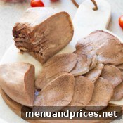 Cooked beef tongue ready to be sliced.