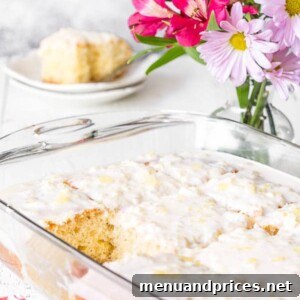 A baking dish of pineapple cake with a square missing.