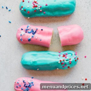 A beautifully presented Gender Reveal Eclairs recipe card image, featuring colorful eclairs.