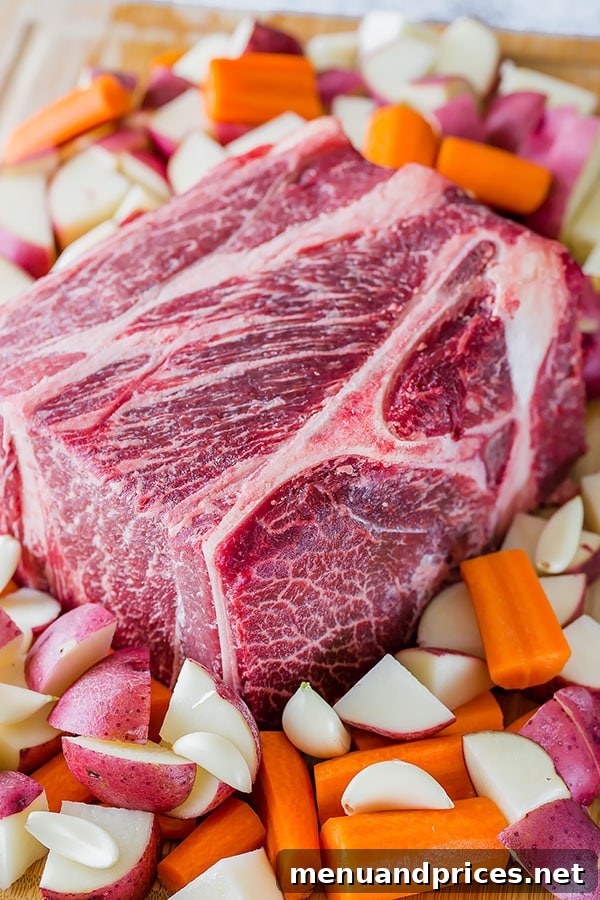 No-Fuss Pot Roast 3 Close-up of a marbled chuck roast, showcasing the fat distribution that contributes to its flavor and tenderness, especially in Wagyu beef.