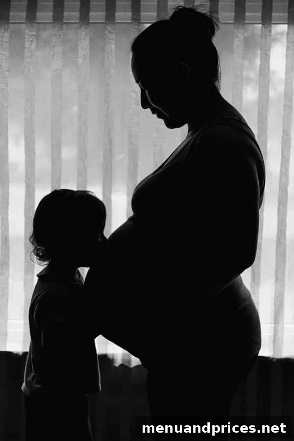 A Second Miracle Unfolds 2 Excited parents awaiting baby number two, with a pregnant belly