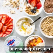 Multiple yogurt bowls showcasing sweet and savory ideas for a healthy breakfast or snack, embodying the ultimate yogurt bar concept.