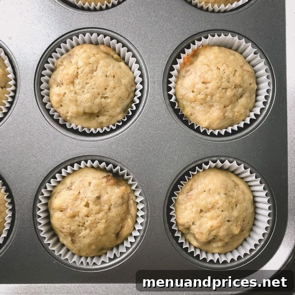 Deliciously Simple Banana Muffins 11 A comparison image showing pale baked banana muffins versus beautifully browned ones, illustrating the positive effect of baking soda on crust color.