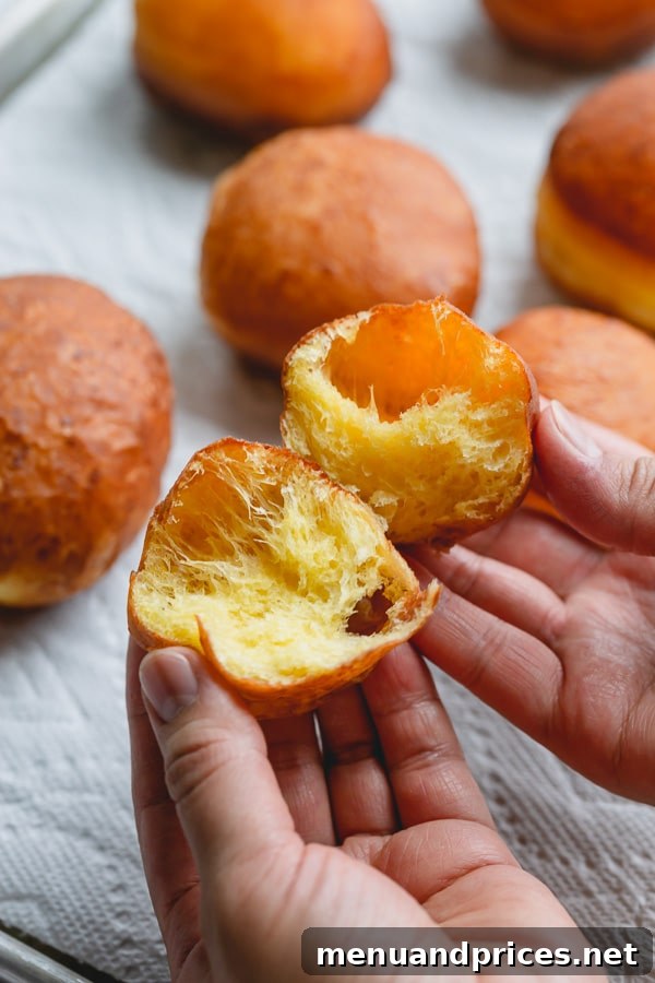 Fluffy Homemade Jelly Doughnuts 3 Light as air, these homemade jelly donuts, also known as Berliners, are pure magic! They're so fluffy, so light and not too sweet! Let me show how to make these treats, step by step. #jellydonuts #donuts #bestdonuts #doughnuts