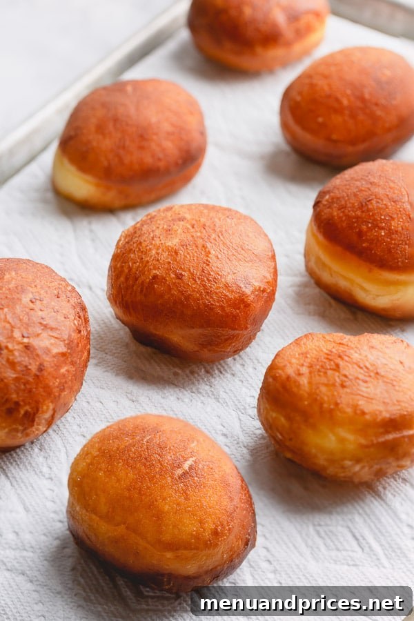 Fluffy Homemade Jelly Doughnuts 9 Light as air, these homemade jelly donuts, also known as Berliners, are pure magic! They're so fluffy, so light and not too sweet! Let me show how to make these treats, step by step. #jellydonuts #donuts #bestdonuts #doughnuts