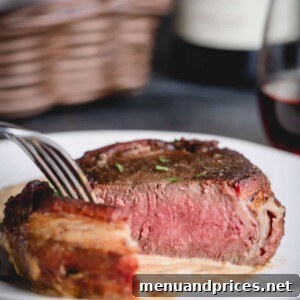 Sliced bacon wrapped filet mignon.