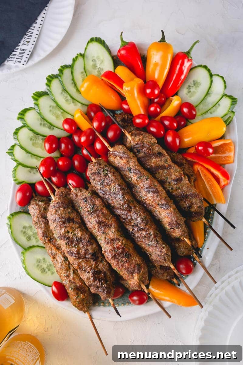 Urfa Kebabs: Mesopotamian Delights 2 Delicious Urfa Kebabs expertly grilled on skewers, showcasing their juicy texture and rich flavor, perfect for a family meal.