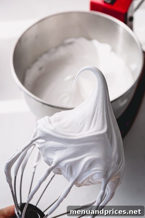 The different stages of meringue, from foamy to stiff peaks.