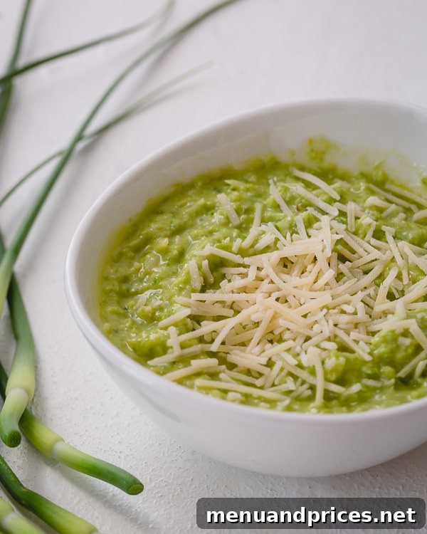 Vibrant Garlic Scapes Pesto from Scratch 2 Vibrant green garlic scapes pesto in a bowl, showcasing its fresh and versatile appeal. A perfect use of spring garlic scapes.