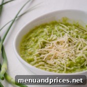 Vibrant Garlic Scapes Pesto from Scratch 6 Close-up of garlic scapes pesto, emphasizing its rich texture and green color.