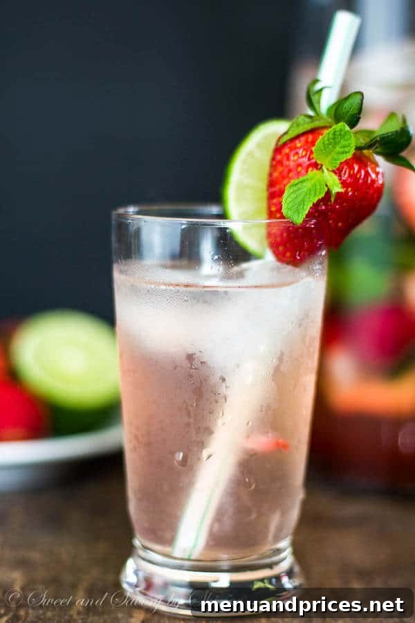 Refreshing pitcher of Strawberry Mojito ready for a party