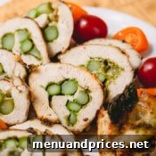 Stuffed chicken roll-ups with asparagus and cheese and smeared with fragrant pesto - an effortlessly impressive and satisfying main dish, or even an appetizer!