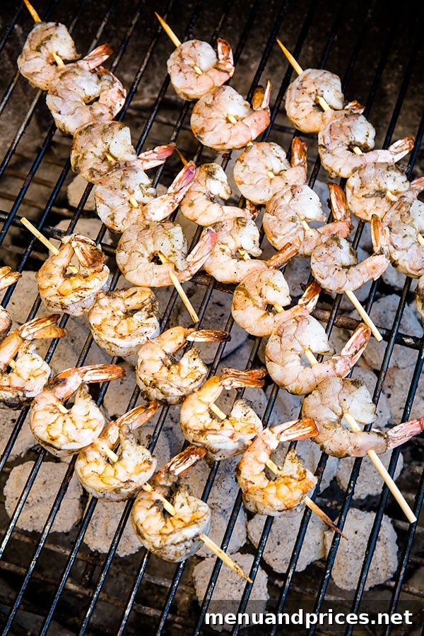 Tropical Jerk Shrimp Skewers 5 Quick and easy grilled shrimp skewers, bursting with Jamaican Jerk flavor! Such an effortless and healthy dinner for hot summer days. #easydinner #appetizer #shrimpskewers #jamaicanjerkshrimp #grilledshrimp