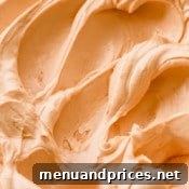 Close-up of a small dessert decorated with Swiss meringue buttercream