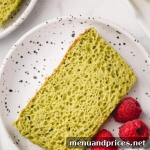 Close-up of a beautifully baked matcha sponge cake, ready to be served.