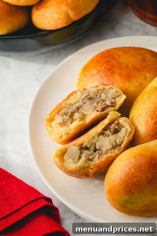 Close-up of baked pirozhki dough rising