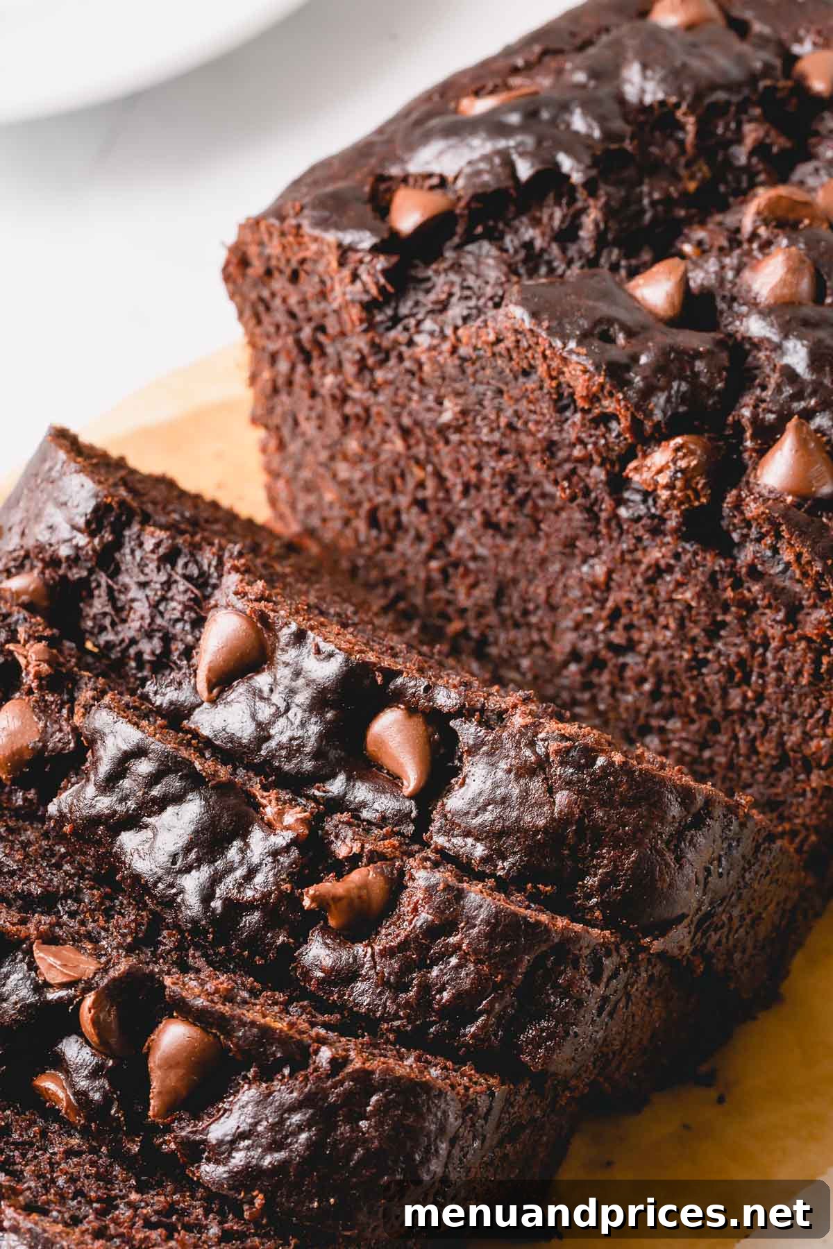 Fudgy Chocolate Banana Bread 5 Beautifully sliced chocolate banana bread showing off its even crumb and melted chocolate chips.