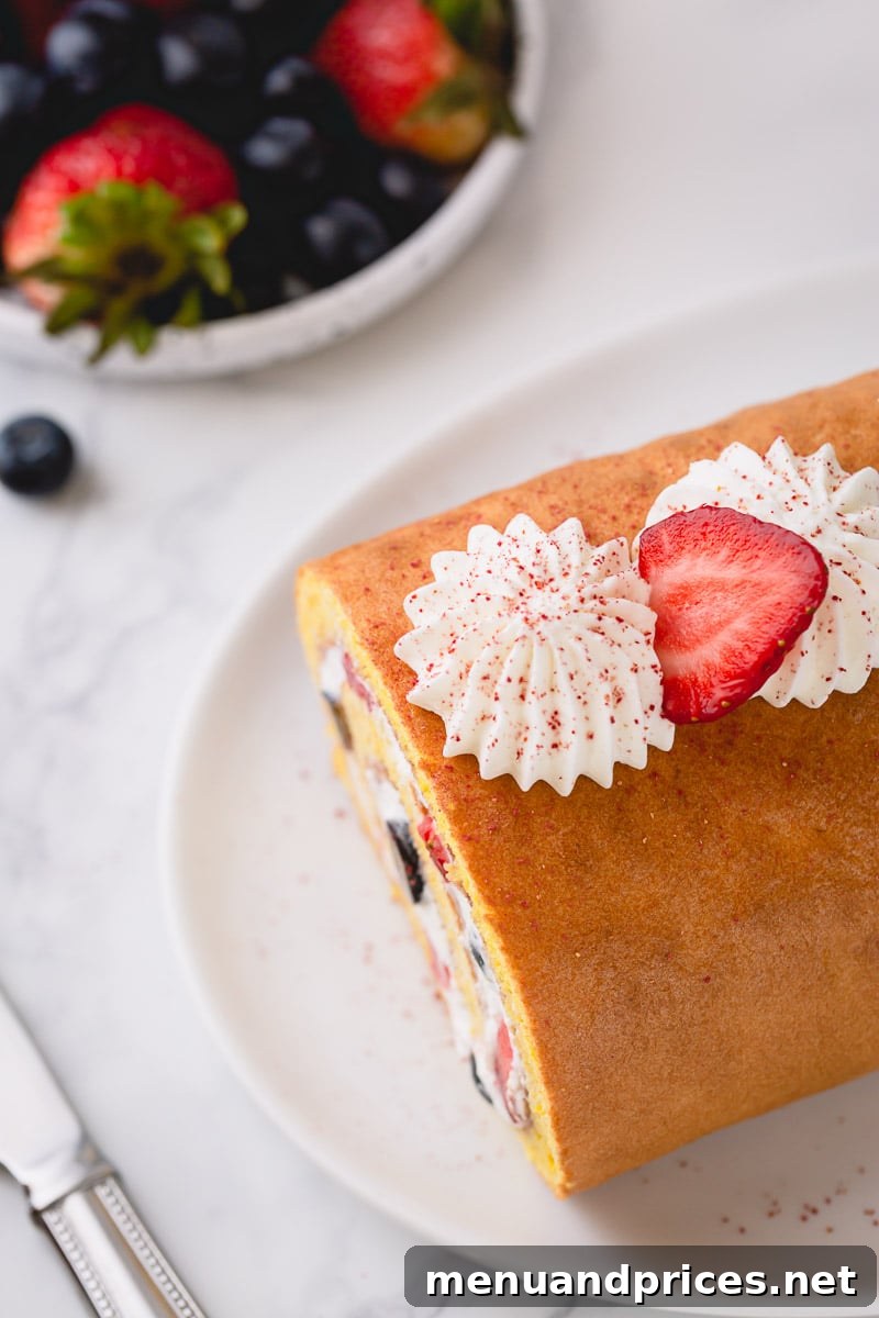 How to make a roll cake, a simpler way. No need to roll the cake while hot, this spring-y sponge cake is super pliable and rolls beautifully without cracks! #rollcake #swissroll