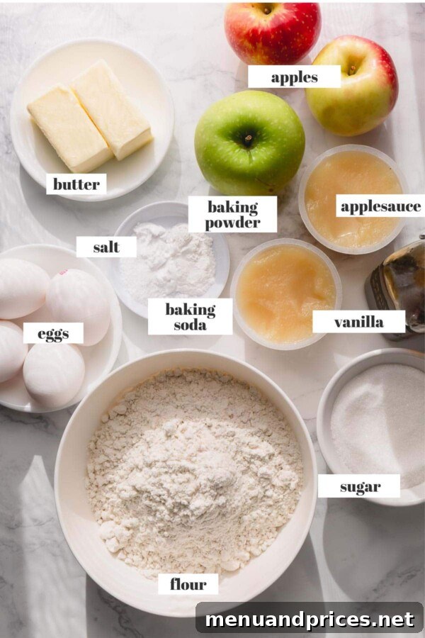 Spiced Apple Streusel Coffee Cake 5 All the key ingredients meticulously arranged for the apple coffee cake: fresh apples, various flours, butter, eggs, and applesauce.