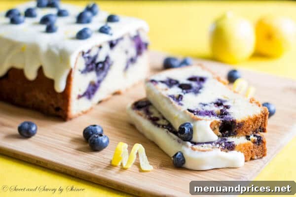 Zesty Blueberry Lemon Delight 4 Ingredients for blueberry lemon cake laid out on a kitchen counter, showcasing fresh blueberries, lemons, and baking essentials.
