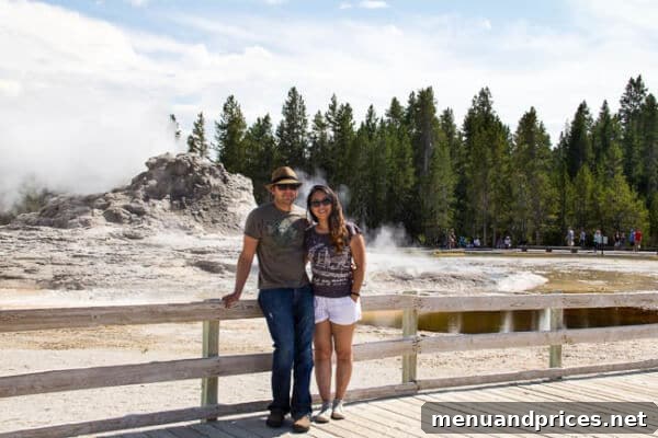 Summer Adventures From Japan to the American West 12 Shinee's husband, Garrat, standing by a natural hot spring in Yellowstone National Park, showcasing the park's geothermal features ~Sweet and Savory by Shinee
