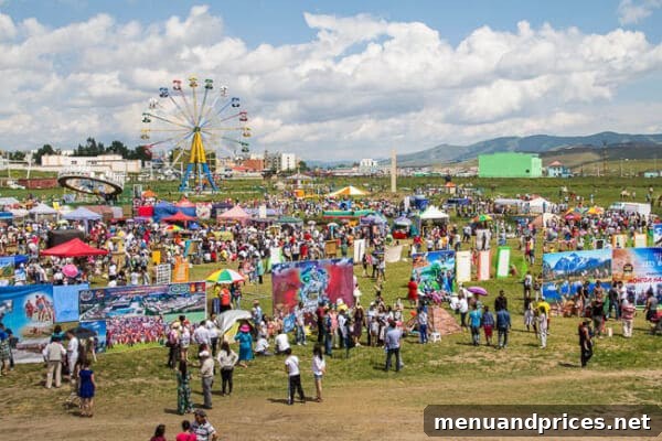 Summer Adventures From Japan to the American West 5 Mongolian men in traditional attire participating in the Naadam festival in Erdenet, Mongolia, with a large crowd gathered to watch the events ~Sweet and Savory by Shinee