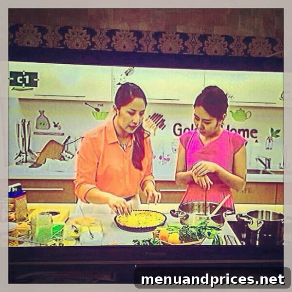 Summer Adventures From Japan to the American West 8 Shinee on the set of 'Sweet Kitchen' TV show in Mongolia, presenting her dishes with a cheerful demeanor, surrounded by studio lights and equipment ~Sweet and Savory by Shinee