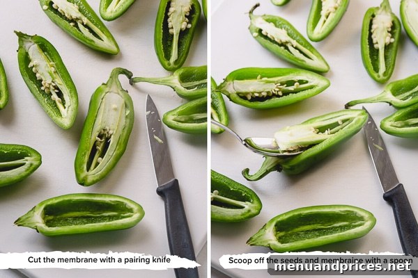 Fresh jalapenos cut in half lengthwise with seeds and ribs removed, ready for filling.