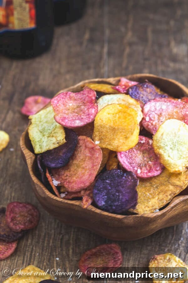 Ultra-Crisp Oven Potato Chips 2 Incredibly crispy baked potato chips, not fried, served in a bowl, showcasing their golden texture and enticing appeal.