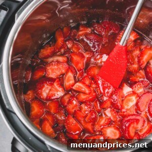 Cooked strawberry jam in an Instant Pot, presented as the recipe image.