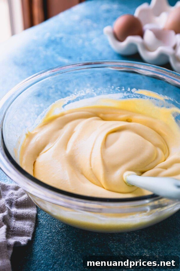 Mastering Classic French Pastry Cream 13 Light and fluffy crème diplomat in a glass mixing bowl.