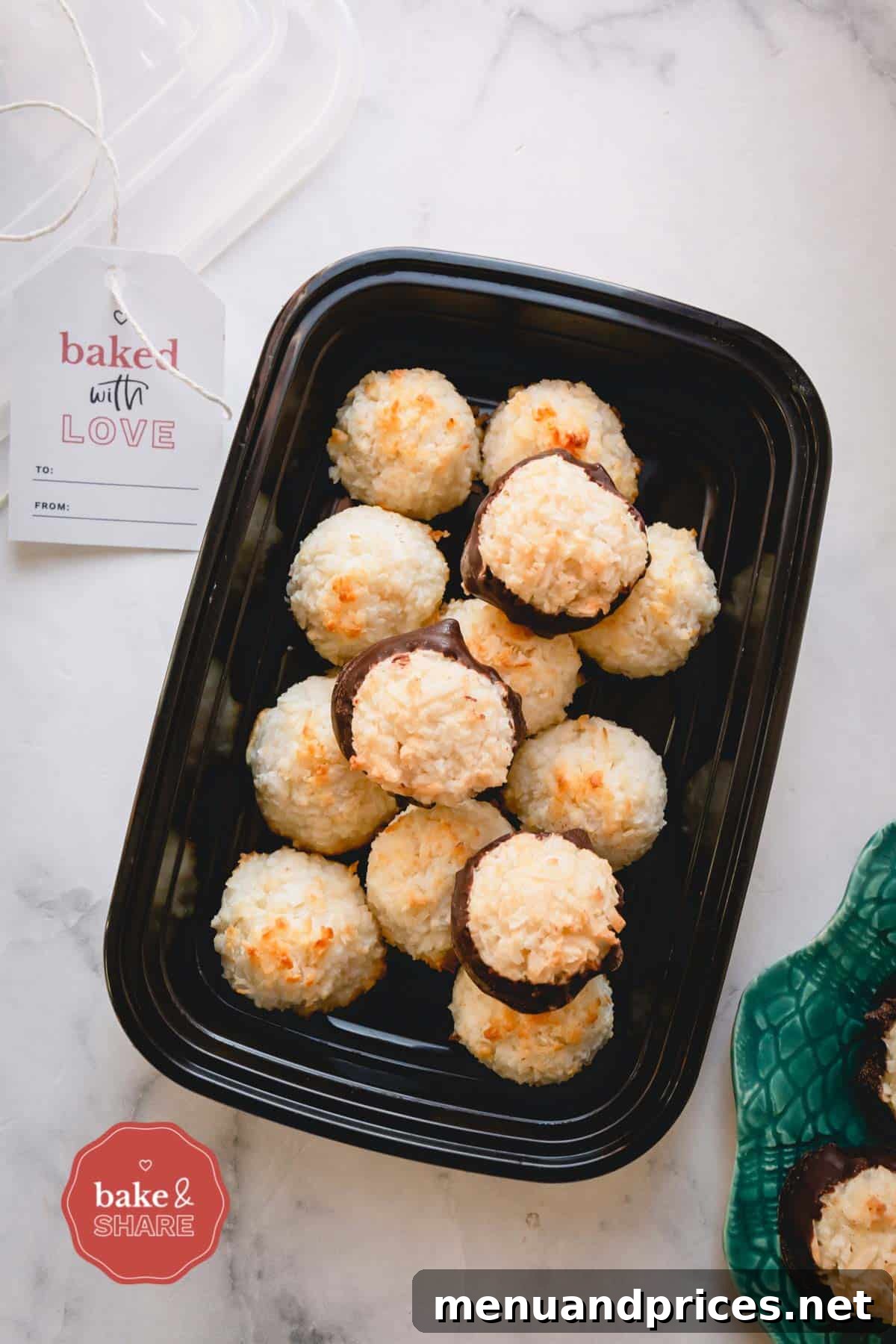Ultimate Coconut Macaroons 11 Freshly baked coconut macaroons stored neatly in a clear plastic container for future enjoyment.