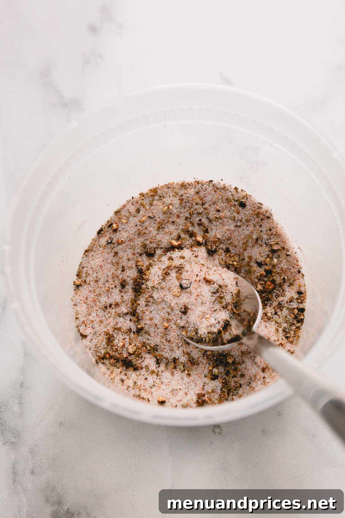 Dry Brining Turkey: Your Guide to a Flawless Roast 5 Dry brine seasoning in a plastic container.